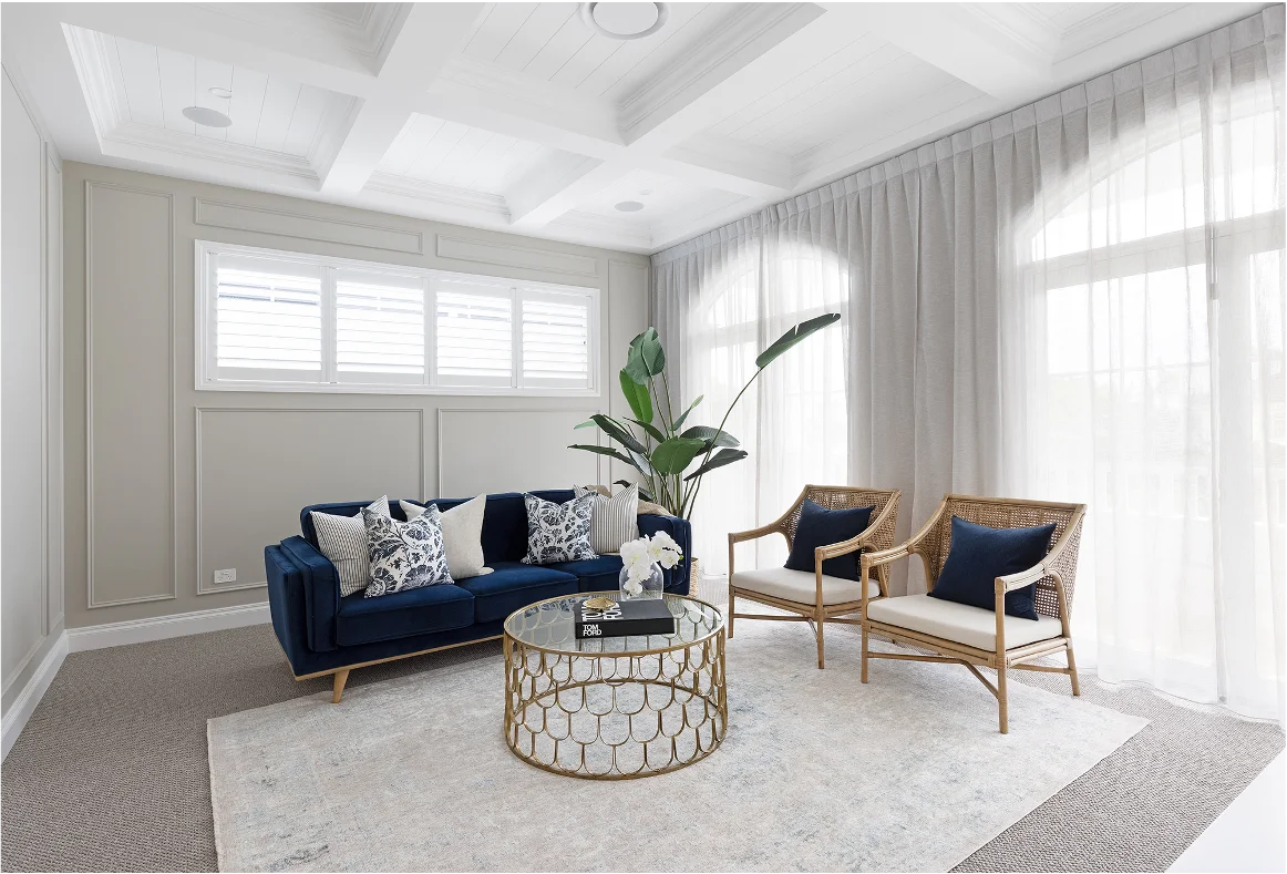 Box pleat sheer curtains in a light-filled living room - Seven Hills
