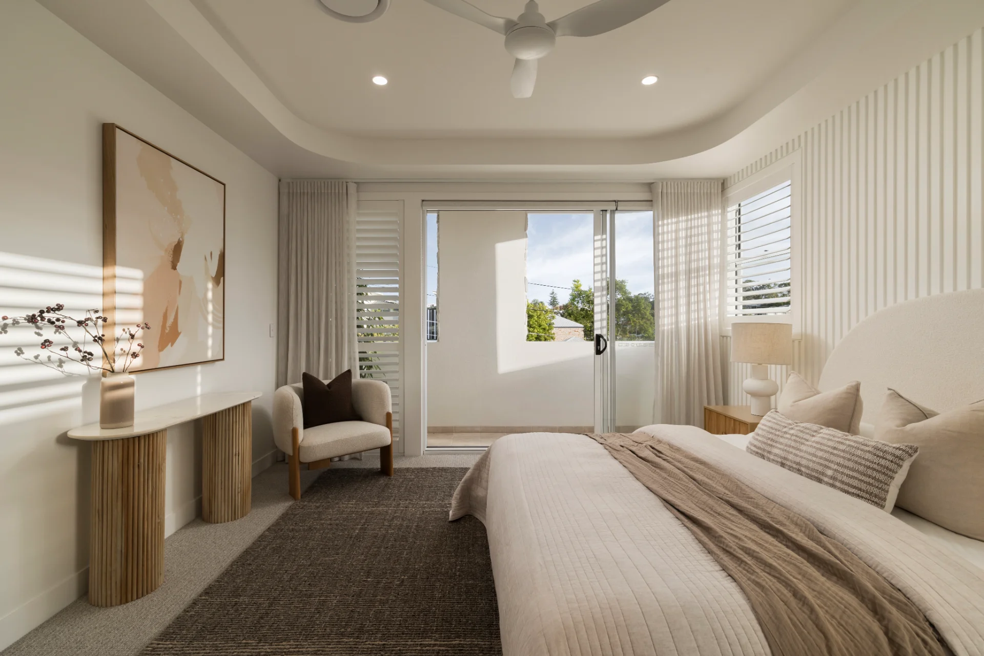 Sheer curtains, PolyShield shutters and roller blinds in a Camp Hill bedroom